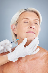 Image showing Beauty, injection and face of senior woman in studio for filler, anti aging and cosmetology on grey background. Cosmetic, skincare and elderly lady facial, plastic surgery and wrinkles treatment