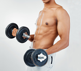 Image showing Man dumbbell exercise, workout fitness and strong athlete in white background studio. Sports training wellness, bodybuilder motivation goal strong power muscle health care with gym equipment.