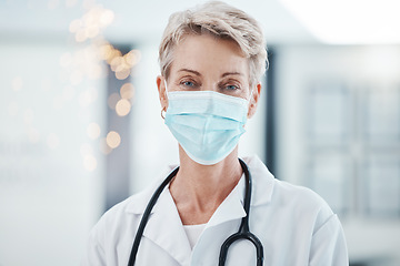 Image showing Covid hospital, woman doctor and portrait of mature, professional and medical cardiology surgeon in wellness clinic. Female healthcare worker, face mask safety and corona virus consulting in surgery