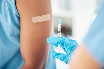 Image showing Doctor hands, covid vaccine or band aid on arm after global virus injection in security, safety or wellness life insurance. Zoom, medical nurse or healthcare worker and plaster for hospital black man