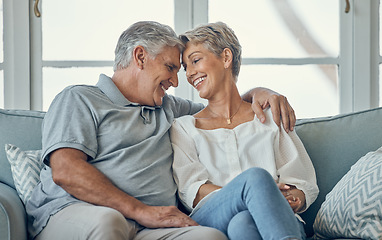 Image showing Happy, smile and senior couple on sofa to relax, talk and bond in the living room of their home. Happiness, love and elderly man and woman in retirement sitting on couch together in lounge at a house