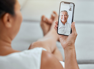 Image showing Phone, video call and senior couple talking, communication or discussion in home. Digital tech, mobile and female relax on sofa on 5g smartphone app, video conference or online video chat in house