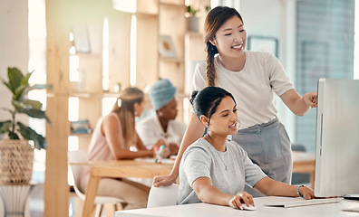 Image showing Employees, team and computer research with speaking, planning or project outcome and analysis at office desk. Happy, Asian manager and woman with digital marketing, discuss work and conversation