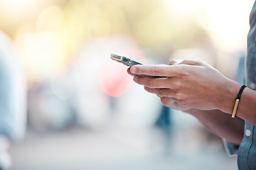 Image showing Communication, typing and hands text on phone in city, outdoors and in street. Social media, internet and person using smartphone for texting, chatting and browsing online media content in urban town