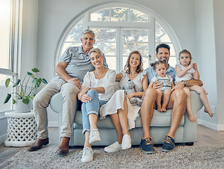 Image showing Big family, portrait and generations relax together on couch in living room at home. Happy grandparents, mother smile and father love adorable young children, calm and sitting on lounge sofa bonding