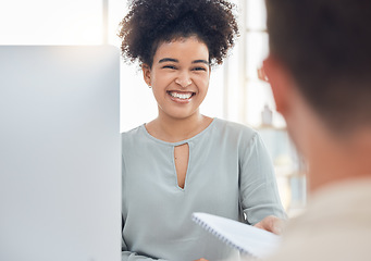Image showing Report, smile and business woman giving a document to a manager while working on a computer. Corporate, happy and African worker with documents for marketing while talking to an employee at work