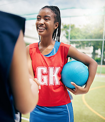 Image showing Black woman, netball player and handshake on court in fitness game, workout match or training competition exercise. Smile, happy and sports women in welcome, thank you or good luck gesture in stadium