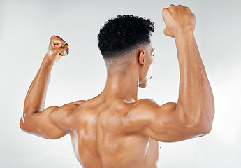 Image showing Strong back muscle, fitness and man with bodybuilding motivation for training, arm exercise and flex workout results. Body health, bodybuilder mindset and toned sports athlete on white background