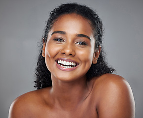 Image showing Black woman, beauty and smile with teeth for skincare, makeup or cosmetics against a grey studio background. Portrait of happy African American model smiling in satisfaction for dental treatment