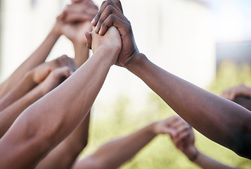 Image showing Diversity, holding hands and support with solidarity and prayer circle outdoor together. Group hands in air, motivation and team building for collaboration help, trust and friends hope for community.