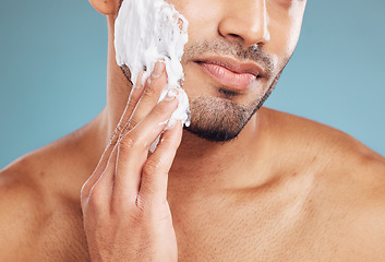 Image showing Shaving cream, skincare and skin grooming of a black man busy with beauty and facial routine. Face health, wellness and cosmetic lotion treatment of a person with beard moisturizer and shave product