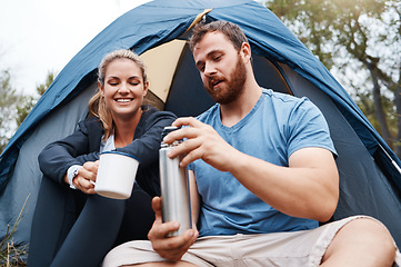 Image showing Camping, tent and couple with coffee in morning, enjoying being outdoors, nature and vacation. Freedom, travel and man with flask pouring hot beverage for woman on camp holiday, weekend and adventure