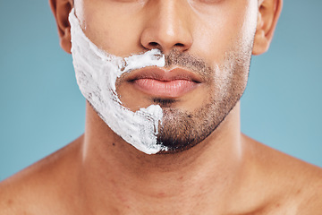 Image showing Face, shaving and beauty cream man closeup of beard facial, wellness and grooming product advertising. Cosmetic, skincare and shave foam hygiene routine of male model with teal studio background.