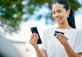 Image showing Woman, phone and credit card for ecommerce, online shopping or transaction in the outdoors. Happy female with smile for internet banking, 5G or fintech app purchase on mobile smartphone technology