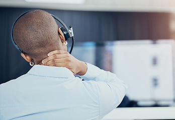 Image showing Black woman, call center or CRM with neck pain, stress or burnout consultant in office with headphones. Customer service, customer support or sales advisor with anxiety, injury or mental health