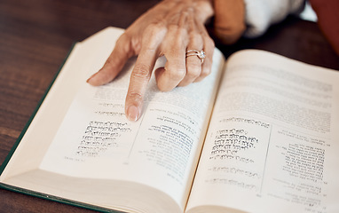 Image showing Islamic, muslim and Quran with hand of old woman reading holy book for prayer, worship or ramadan kareem celebration. Arabic, God and religion with lady and dua for spiritual, faith and eid mubarak