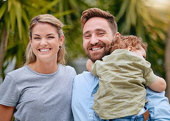 Image showing Smile, portrait and family in nature for love, relax and peace together on a holiday in Portugal. Happy, vacation and mother and father with a sleeping child in a backyard or garden in summer