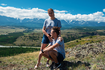 Image showing Loving couple together on mountain