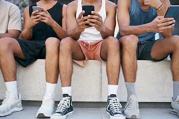 Image showing Digital devices, group and young men on social media, browse internet and reading online in city being trendy together. Smartphones, edgy and boys scroll apps, casual and outdoor relax in summer.