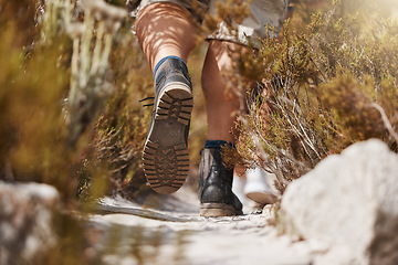 Image showing Hiking, shoes and man in a forest for fitness, exercise and workout in nature with morning cardio closeup. Feet, hiker and sports guy walking along a path in the woods, relax, zen and peaceful