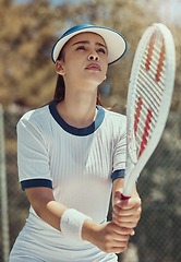 Image showing Woman fitness, sports and tennis racket for start of game, match or tournament competition with flare. Motivation, exercise and training girl with winner mindset prepare for tennis court workout