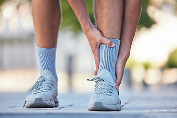 Image showing Man, feet or ankle pain in running fitness, training or exercise in New York city, street or road. Zoom, personal trainer or runner with sports injury in legs from workout burnout or anatomy accident