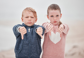 Image showing Sad children portrait, hands thumbs down or outdoor with news of negative Ukraine problem to protest war. White siblings vote no, angry emoji in cold winter and sign language rejection gesture