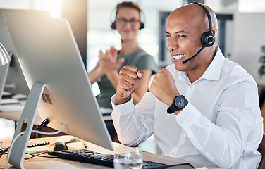 Image showing Customer service, telemarketing and contact us worker celebration for promotion, sale or goal in call center. Black man working with crm, communication or support online while excited, target or wow