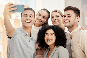 Image showing Diversity work, happy group selfie with phone in office for solidarity or team building in marketing startup. Multicultural team smile, smartphone photo together or workplace happiness community