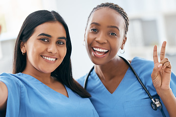 Image showing Nurses, medical students and women taking selfie for social media, collaboration or healthcare commitment in hospital. Happy, portrait and diversity clinic doctors on internship taking photo together