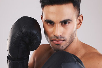 Image showing Fitness boxing, man training workout and portrait of exercise gear glove on fists ready to fight. Young muay thai athlete, strong muscle power motivation and mma sports boxer face in gym with gloves