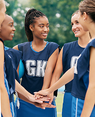 Image showing Support, teamwork and sports with netball women for motivation, planning and training on field. Happy, vision and goals with diversity of friends hands in outdoor park for games, summer and workout