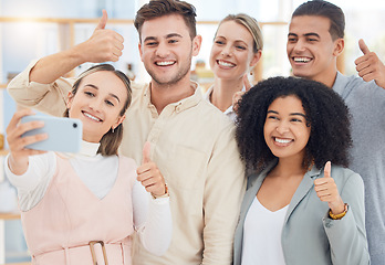 Image showing Selfie, thumbs up and business people with a phone for team building, partnership and collaboration in an office at work. Thank you, vote and hand of workers for photo on social media with a mobile