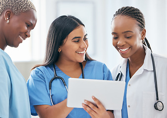 Image showing Happy women doctors, digital tablet or teamwork, planning or collaboration staff working online, technology ir support in hospital. Healthcare group consulting medical research on internet connection