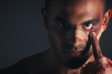Image showing Boxer, injured and black man fighter face with a serious sport injury from a boxing fight match. Portrait of facial wound and black eye from a sports accident of a professional athlete from conflict