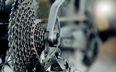 Image showing Cycling speed, bicycle gears and chain, cycle speed mechanic wheels of metal, iron or steel closeup. Mountain bike back wheel, extreme sports and fitness exercise riding on outdoor adventure trail.