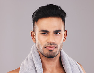 Image showing Portrait, man and exercise for wellness, towel for workout and grey studio background. Young Indian male, confident and focus for organic facial, proud and clear skin being determined and on break.
