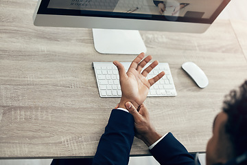 Image showing Hand pain, computer and business man working in office while suffering from arthritis, injury and muscle inflammation from above. Wrist pain, worker and man with carpal tunnel syndrome while typing