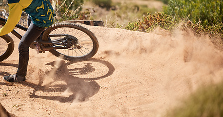 Image showing Extreme sport, dirt bike and dust with cyclist riding for adrenaline in competitive competition. Bicycle, fast and biking mountain bike racer ride on dusty path. Sport, athlete and cycling for sports