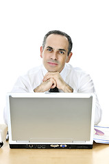 Image showing Businessman at his desk on white background