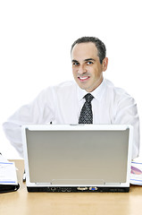 Image showing Businessman at his desk on white background