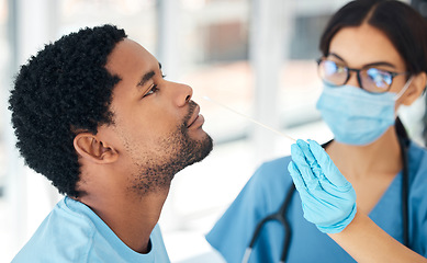 Image showing Healthcare, hand and covid test by doctor with man in hospital for diagnosis, compliance and health check. Medical, research and corona testing by nurse and patient nose, sample and consultation room