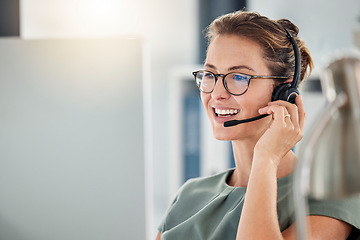 Image showing Happy call center woman consulting customer for customer support, help or telemarketing sales. Sales advisor, CRM girl with smile for success customer service, contact us hotline or insurance deal