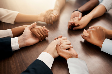 Image showing Support, community and business people praying in a meeting for teamwork, partnership and goal in corporate together. Hands of employees in collaboration, worship and communication at a conference