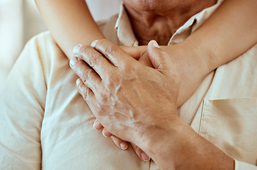 Image showing Hands, support and senior man with comfort or help from a caregiver in a retirement home. Retired, empathy and closeup of a nurse comforting an elderly pensioner or patient at a nursing facility.