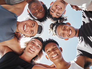 Image showing Teamwork, support and sports with basketball man from bottom for training, health and fitness. Community, goals or motivation with group of people in huddle for exercise, workout and friends together