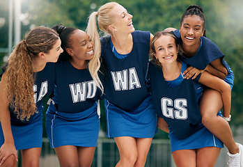 Image showing Fitness, sports and netball girl team at court for training, bonding and relax before sport exercise outdoors. Diversity, netball players and women friends hug before workout, playing and performance