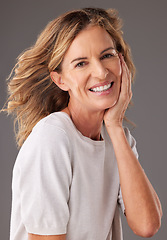 Image showing Beauty, wellness and portrait of senior woman with smile on face for skincare, body care and anti aging beauty products. Natural, healthy skin and mature female with confidence isolated in studio