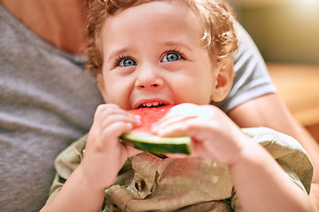 Image showing Watermelon, mother and child in nature with smile, love and happy together in Australia. Summer, food and baby eating fruit for nutrition, health and diet on a picnic in a backyard, garden or park