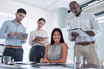 Image showing Black woman, leader and training business people writing, planning and working in office. Portrait, business woman and coaching with mentor business meeting for team sharing goal, vision and strategy